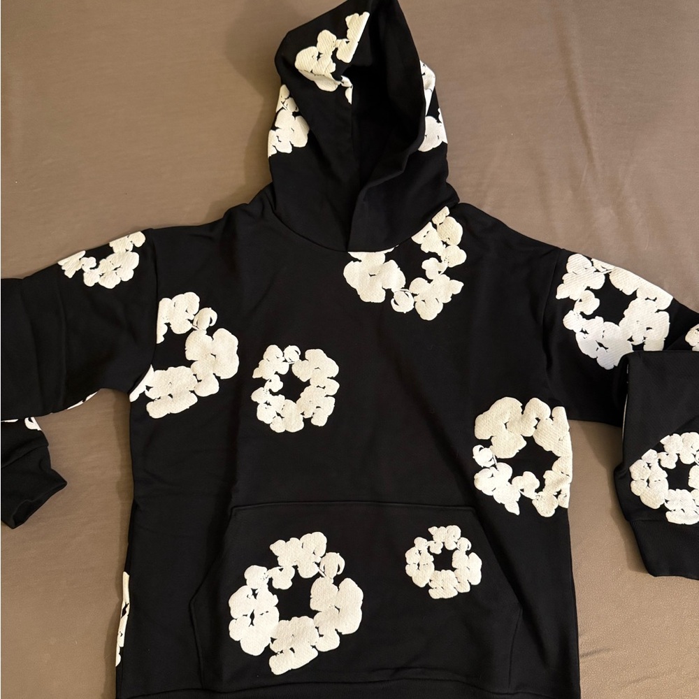 Denim Tears Black Hoodie with White Floral Design
